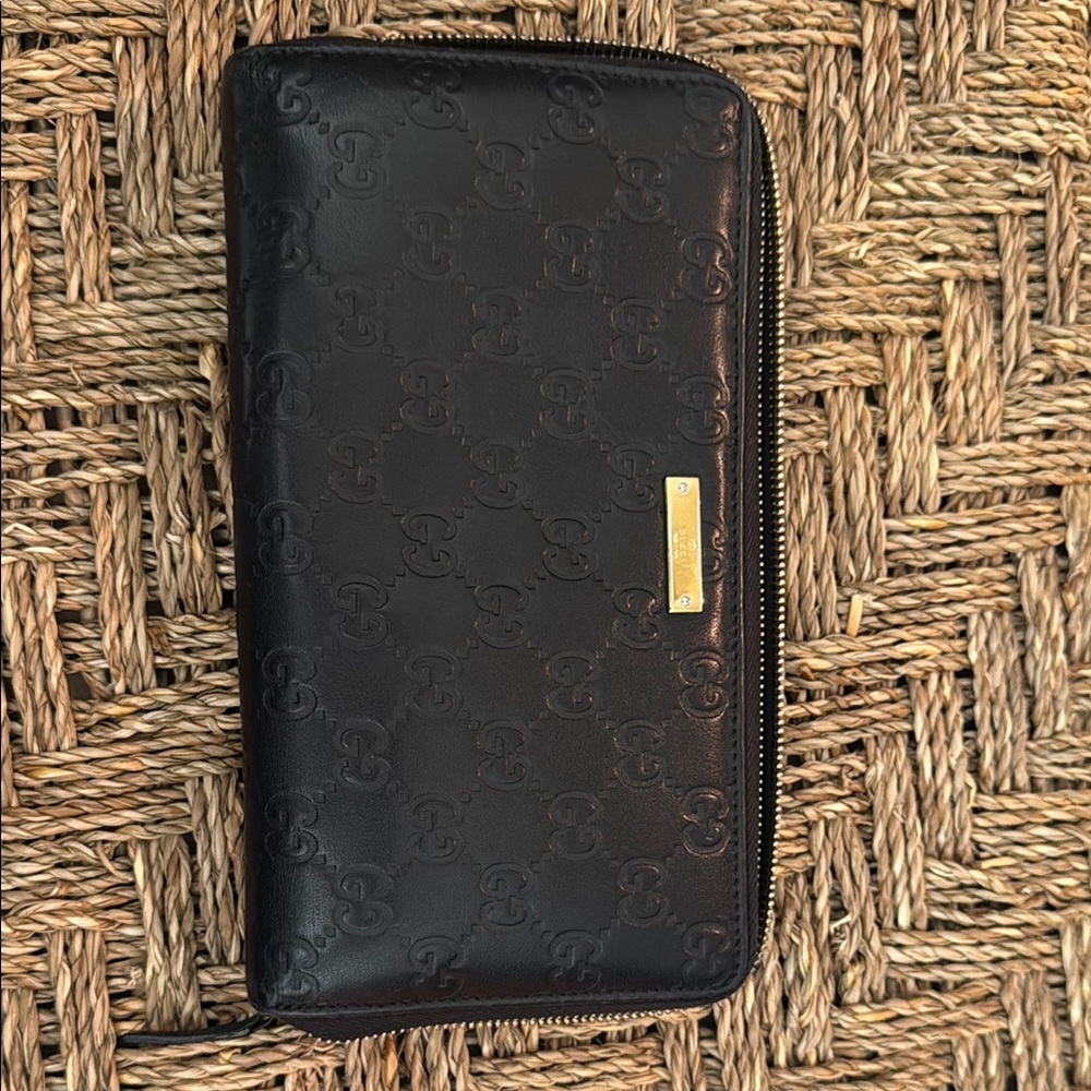 Gucci Black Embossed Leather Zip Wallet with Gold Accent